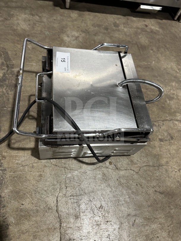 Cecilware SG-1LG-120 stainless steel panini press with grooved grates, thermostatic control, used condition, visible label.
