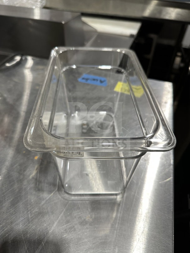 Cambro polycarbonate clear 1/4x6" high heat food pan, model 6311, in good condition with visible product label.