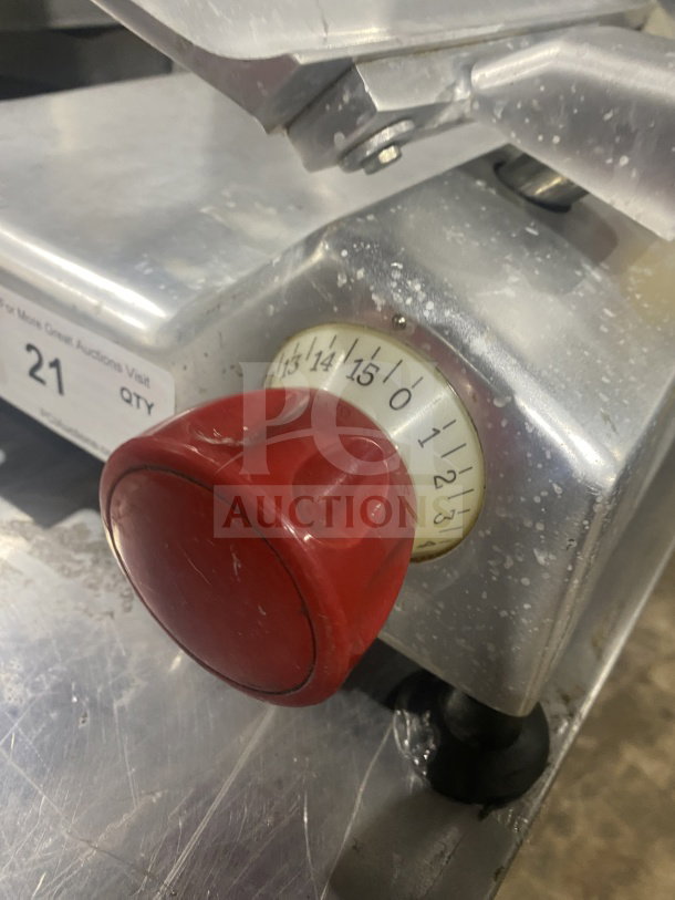 Berkel Model 827-A deli meat slicer with stainless steel body, red adjustment knob, and visible wear, serial EN-1005977.