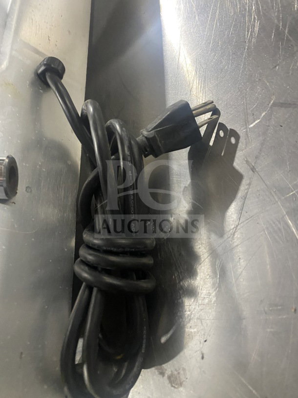 Berkel Model 827-A electric deli meat slicer power cord, coiled, compatible with 115V 1Phase. Commercial-grade durability.