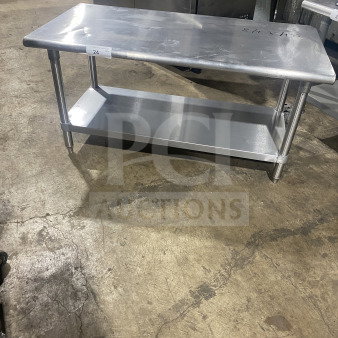 L&J stainless steel equipment stand with two compartments on legs, commercial grade, metal surface shows light wear.