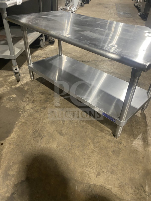 L&J stainless steel two-compartment equipment stand on legs, suitable for commercial use, in good condition.