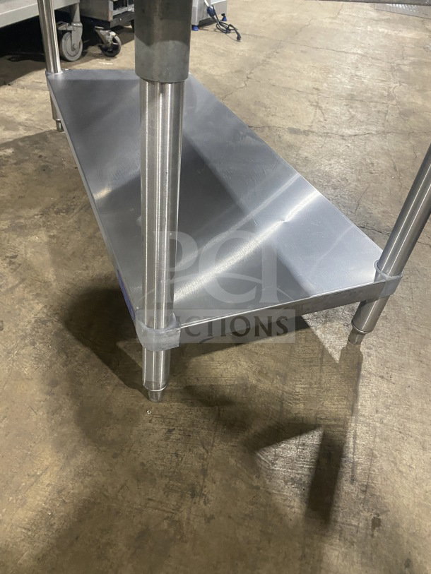 L&J stainless steel equipment stand, two compartments, on legs, excellent condition, commercial use.