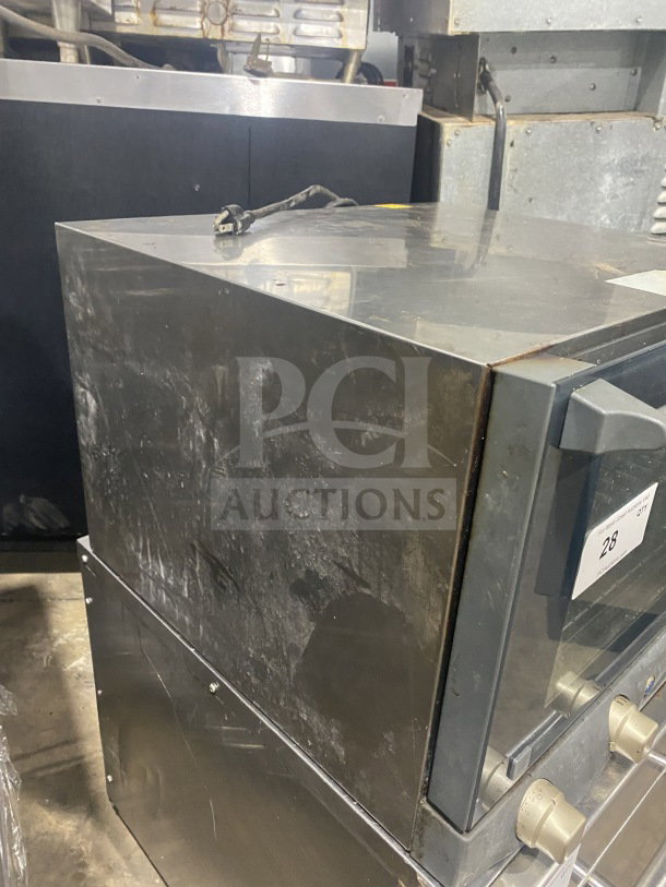 Unox Cadco Lisa Series Model XAF013 commercial countertop convection oven, metal racks, 120V, worn exterior, SN: 20160008756.