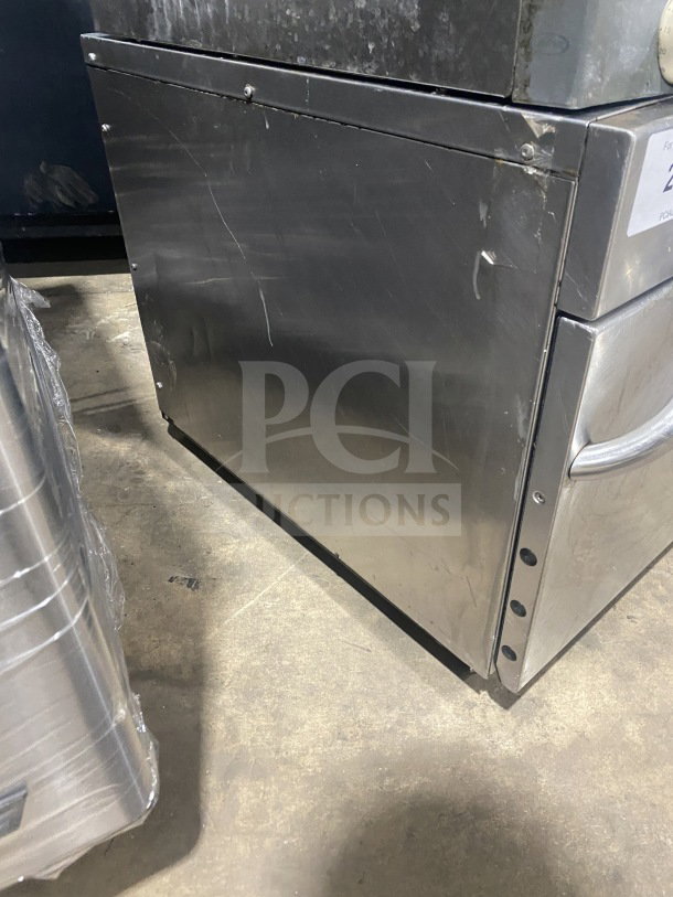 Amana AXP22 stainless steel turbo oven, countertop model. Electric, 208-230V, 1 Phase. Light surface wear visible.
