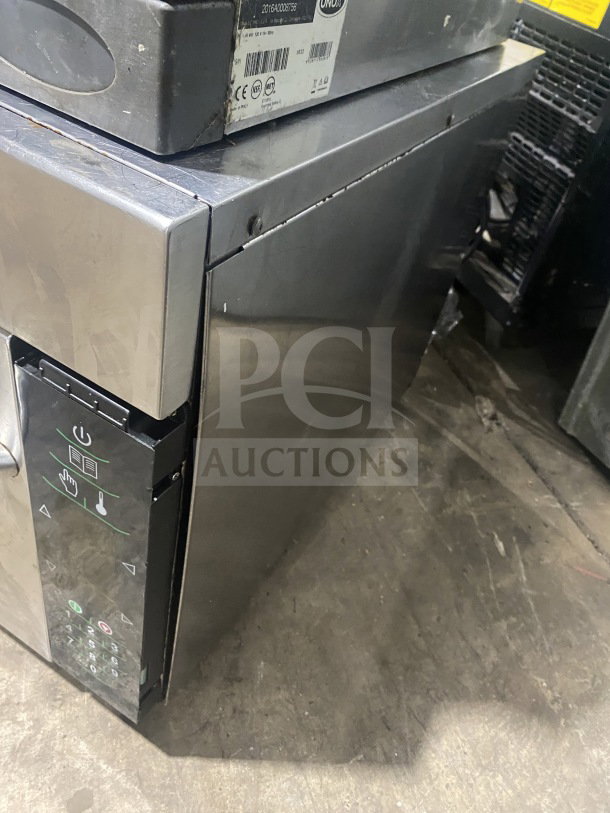 Amana AXP22 commercial stainless steel countertop rapid cook turbo oven, 208-230V, visible control panel, good condition.