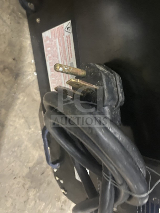 Amana AXP22 Turbo Oven cord and plug detail with visible label; 208-230V, 1Phase.