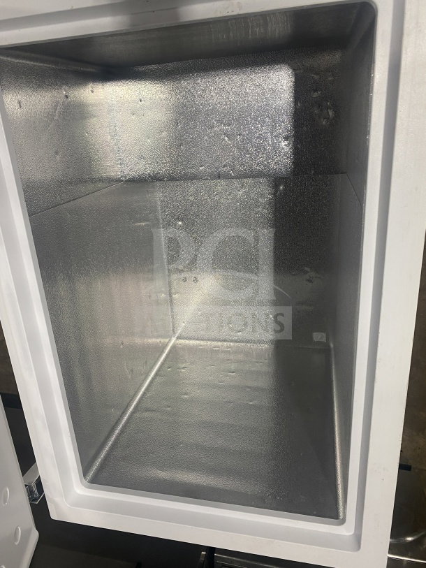 2019 Continental chest freezer, model CEFR091, electric, white solid lid, interior view, excellent condition, 115V.