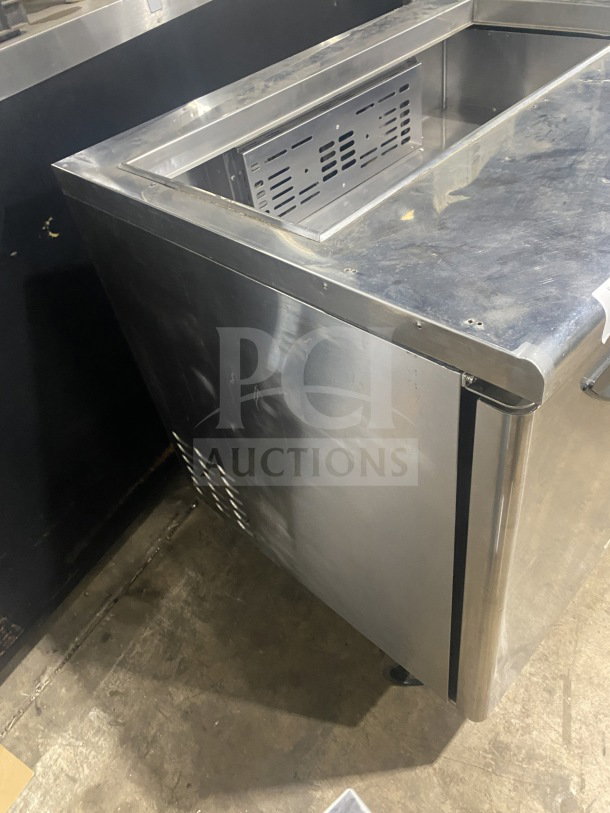 Turbo Air TST-36SD stainless steel refrigerated sandwich prep table, two-door storage, cutting board, on casters, 115V.