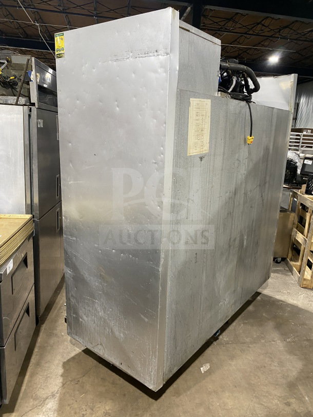 Traulsen G31010 commercial stainless steel triple door freezer, electric, Energy Star certified, on casters, with minor wear.