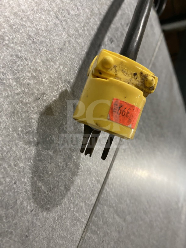 Yellow electrical plug for Traulsen Commercial Stainless Steel Triple Door Reach-In Freezer, Model G31010, 115V.