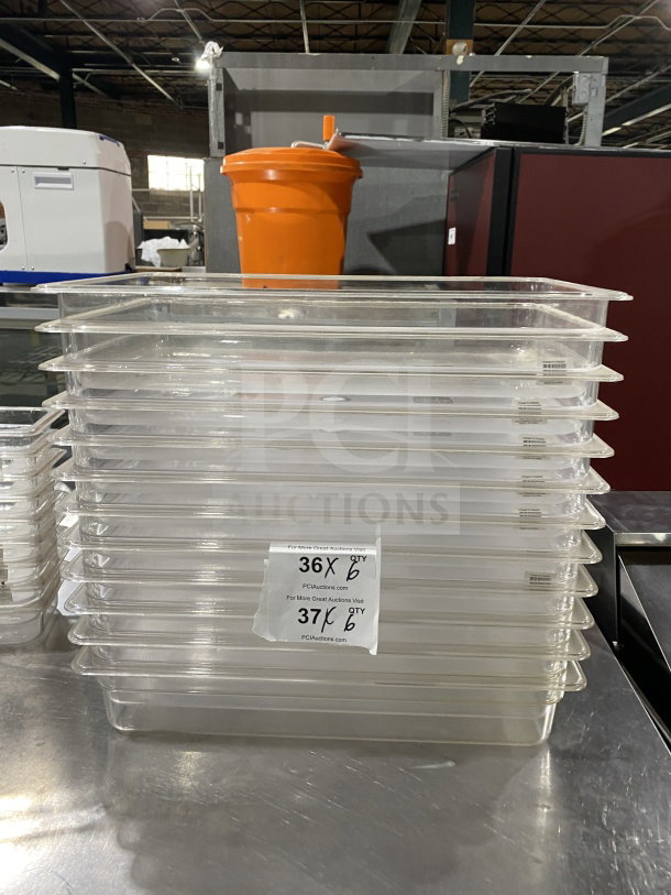 Thunder Group PLPA8001 commercial polycarbonate 1/1 4" clear food pans, stack of six, with auction labels indicating quantities.