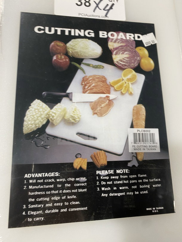 Brand new Thunder Group PLCB002 white non-skid cutting board with handle hole. Durable, easy to clean, made in Taiwan.