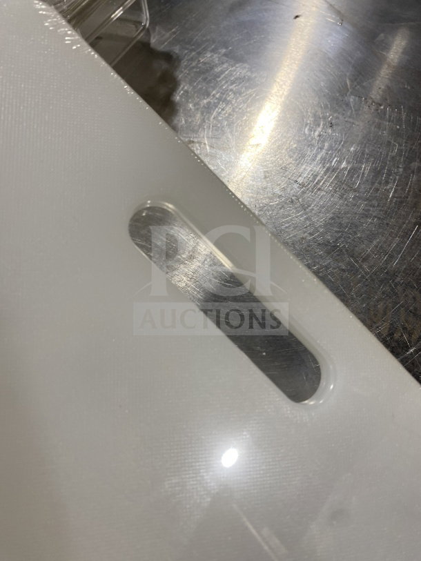 Brand new Thunder Group PLCB002 white non-skid plastic cutting board with handle hole, commercial grade.