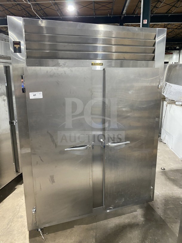 Traulsen Spec-Line Series stainless steel 2-door reach-in freezer, model RLT232WUTFHS. Chrome rack, on casters.