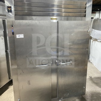 Traulsen Spec-Line Series stainless steel 2-door reach-in freezer, model RLT232WUTFHS. Chrome rack, on casters.