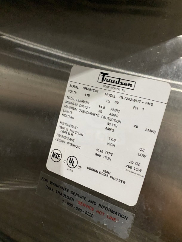 Traulsen Spec-Line Series 2-door stainless steel reach-in freezer, model RLT232WUTFHS, on casters, with label.