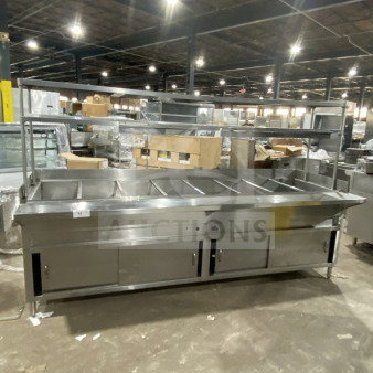 L&J commercial stainless steel 5-well steam table with double overshelf, sliding 2-door base, on legs; used condition.