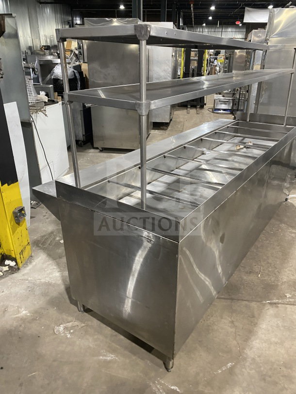 L&J stainless steel 5-well hot food steam table with double overshelf, enclosed sliding 2-door base, and legs, in good condition.