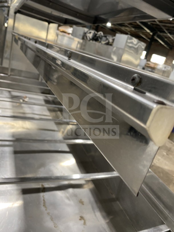 L&J stainless steel 5-well steam table with double overshelf, enclosed sliding 2-door base, on legs. Appears in used condition.
