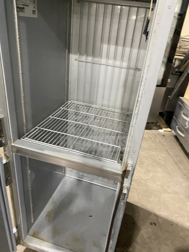 Beverage Air Horizon Series stainless steel half-door refrigerator/freezer, Model HF1HC-1HS-RC-18, with poly-coated wire rack, on casters.