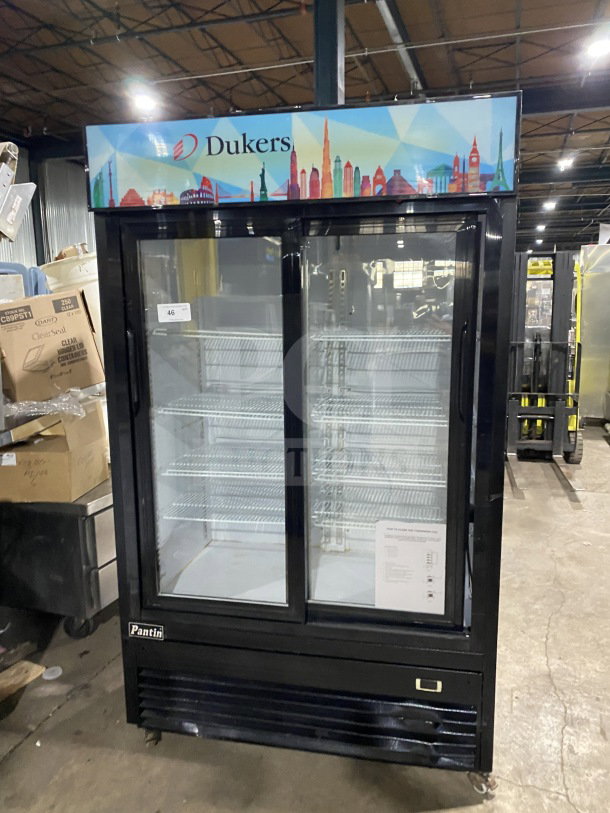 Dukers Pantin GDM40BS 2-sliding glass door reach-in refrigerator merchandiser with poly-coated racks, on casters.