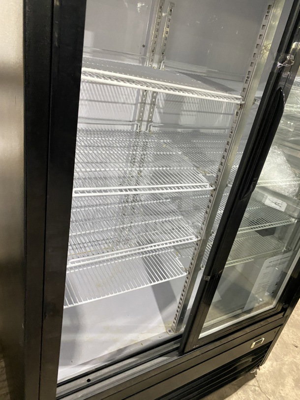 Dukers Pantin Series GDM40BS commercial refrigerator, 2-sliding glass doors, poly-coated racks, on casters, 115V.
