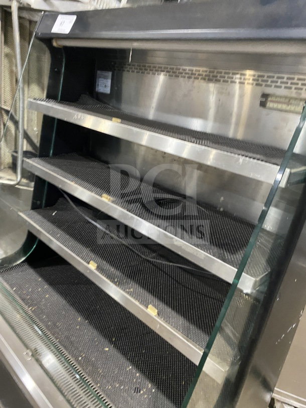 Turbo Air commercial black multi-tier refrigerated display case, model TOM-40M(B), with stainless steel interior.