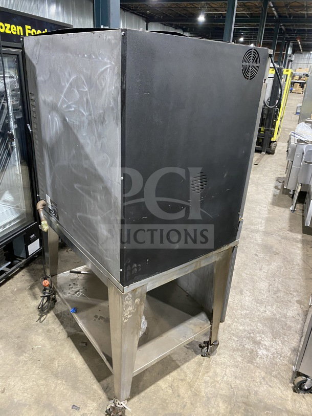 Cleveland Range BMR-32 commercial electric rotisserie convection oven on metal stand, used condition, Serial: WC36393-961-48.