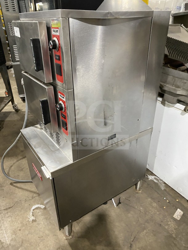 Vulcan V3X246 commercial food steamer, two compartments, stainless steel, on casters, model and serial numbers visible.
