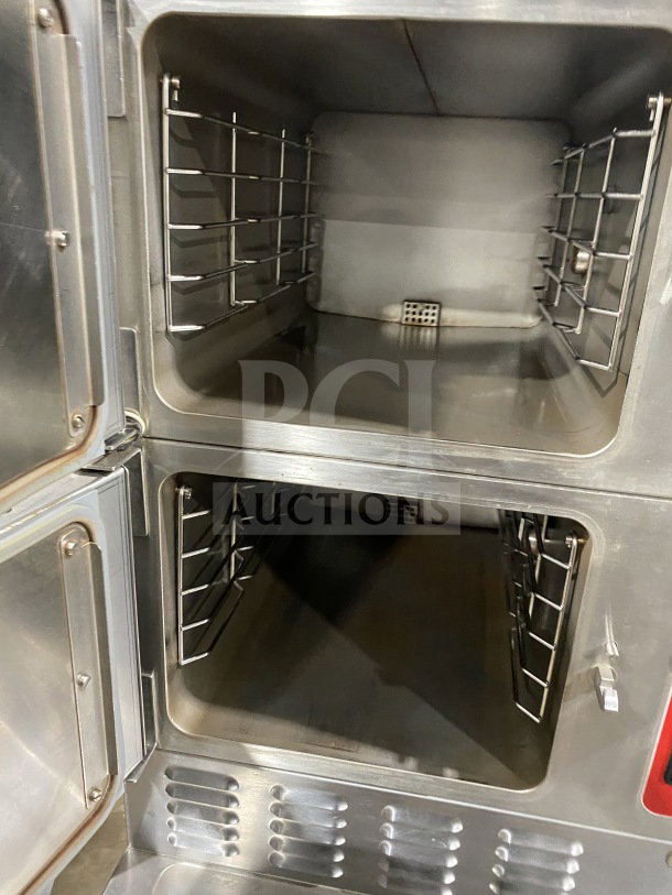 Vulcan Series 2 Compartment Commercial Food Steamer, Model V3X246, stainless steel, on casters, interior view.