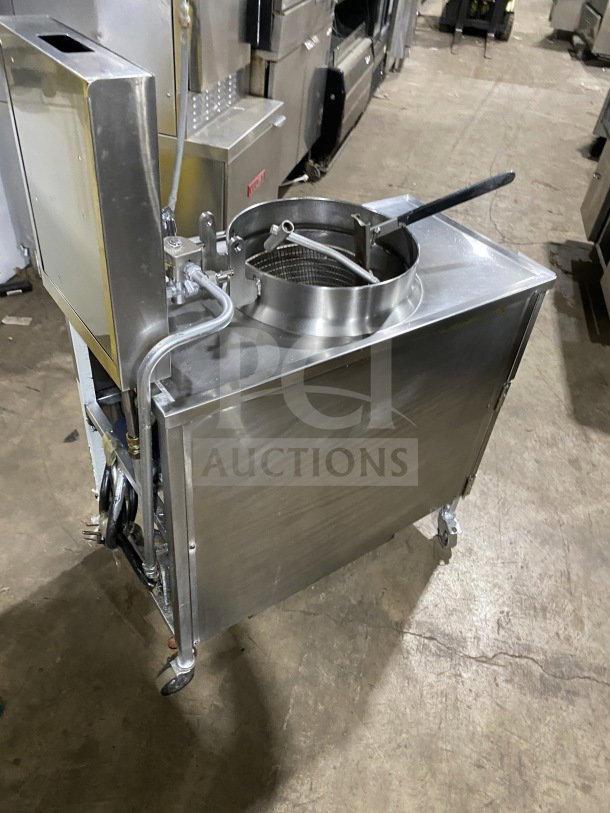 BKI LPF-F48 commercial electric pressure fryer with oil filter, stainless steel, on casters, 208V, used condition.