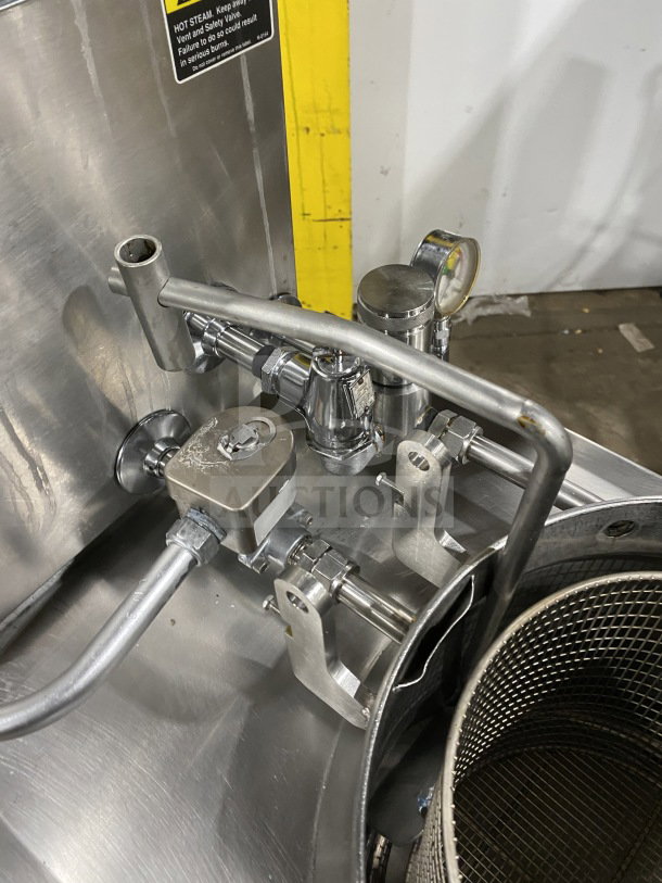 BKI LPF-F48 commercial electric pressure fryer with oil filter and gauge, stainless steel, 208V, mounted on casters.