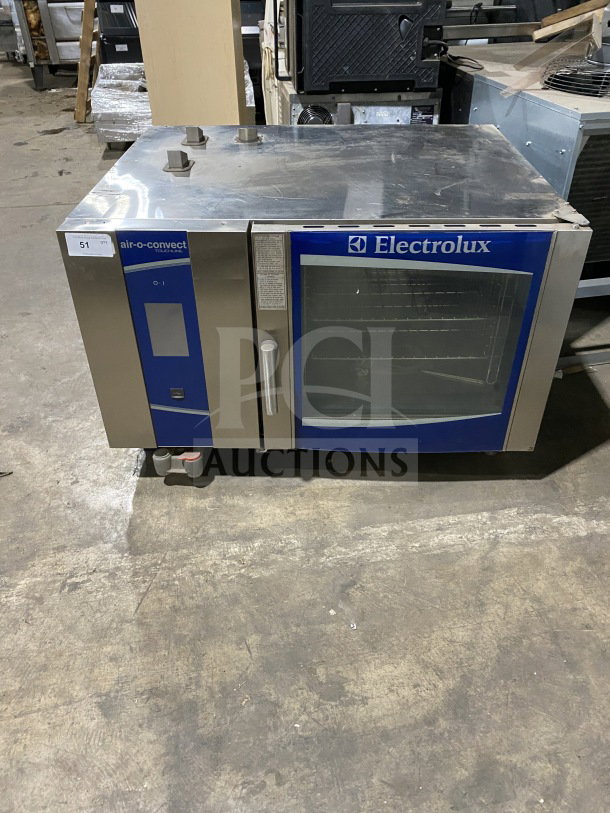 Electrolux Air-O-Convect AOS062GKP1 stainless steel combi oven, natural gas, touch controls, wired rack, model SN:40510001.