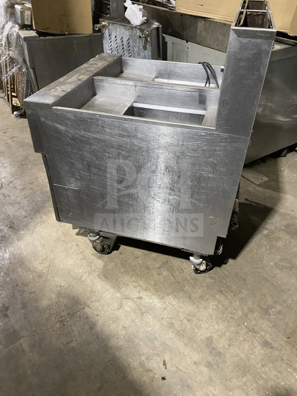 Pitco Solstice Supreme Series SSH55 2-Bay 50Lb. Deep Fat Fryer, stainless steel, on casters, with filtration system.