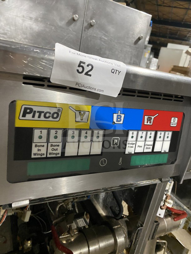 Pitco Solstice Supreme SSH55 stainless steel 2-bay fryer, 50 lb capacity, with filtration, basket hanger, and casters.