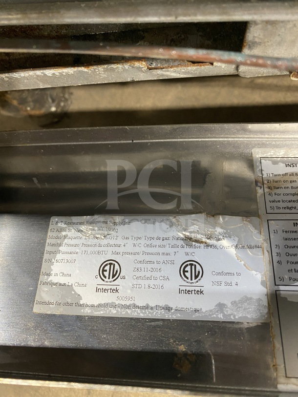 Pantin LI-RGR36-G12 36" gas range, stainless steel, 12" griddle, 4 burners, standard oven, SN: 18071307, rust on label.