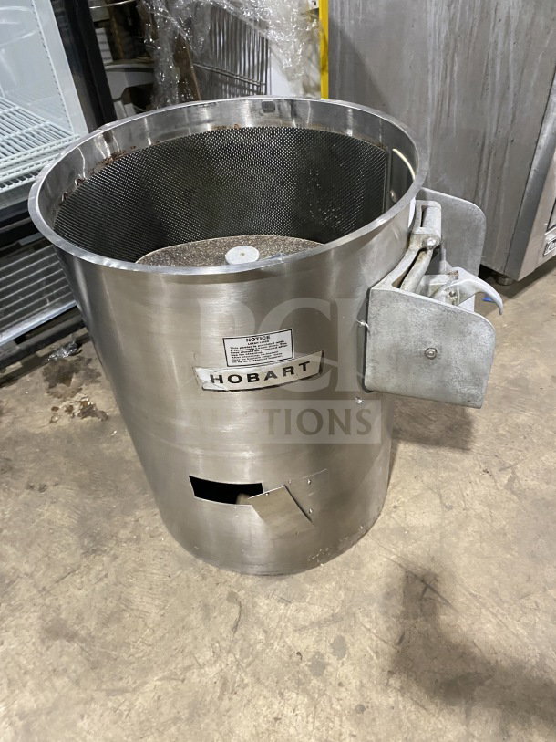 Hobart commercial stainless steel electric potato peeler, cylindrical design, used condition, visible brand label.