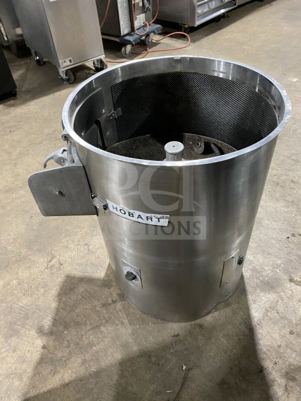 Hobart commercial stainless steel electric potato peeler, cylindrical design, visible Hobart logo, used condition.
