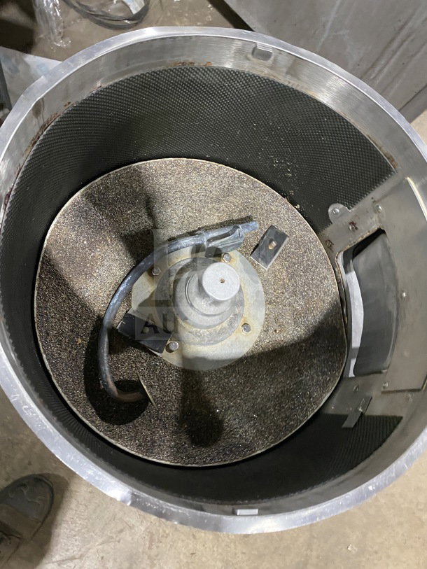 Hobart commercial stainless steel electric potato peeler, interior view, showing abrasive disk, used condition.