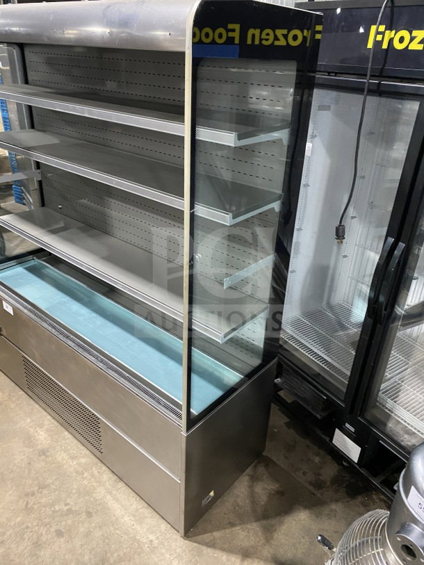 Commercial stainless-steel open-air merchandiser, electric powered, with adjustable shelves. Appears in good condition.