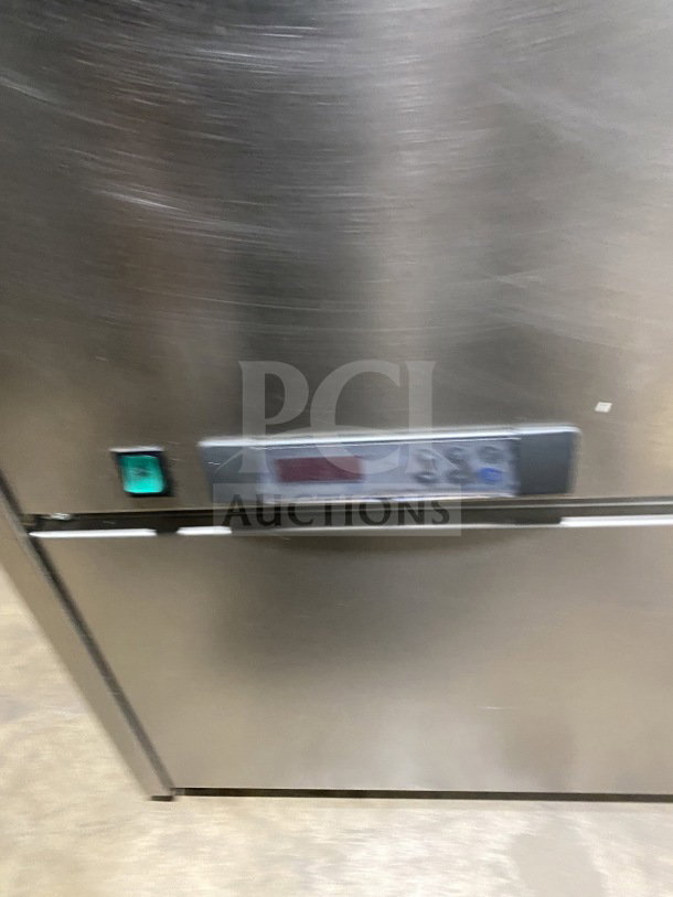 Commercial stainless-steel open-air merchandiser, electric powered, control panel with buttons, polished finish, good condition.