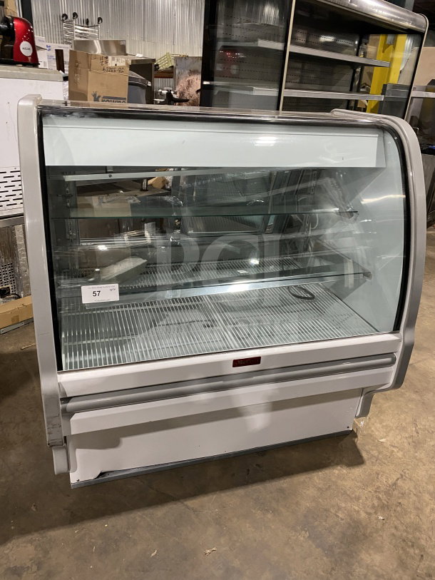 Howard-McCray refrigerated bakery display case, Model SC-CBS40E-4C-LED, 115V, glass shelves, excellent condition.