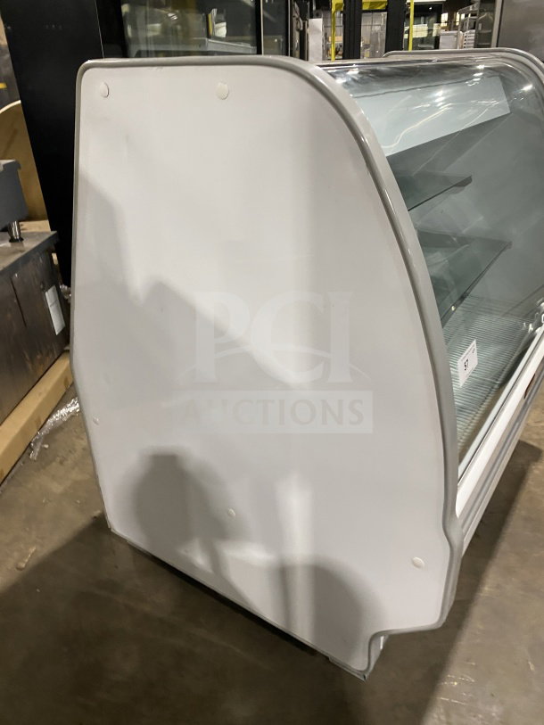 Howard-McCray refrigerated bakery display case, model SC-CBS40E-4C-LED, in good condition, 115V 1 Phase.