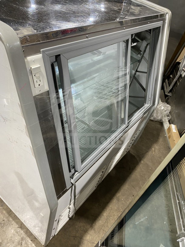 Howard-McCray SC-CBS40E-4C-LED refrigerated bakery display case, 115V 1 phase, glass doors, SN: 14-37067-12, good condition.