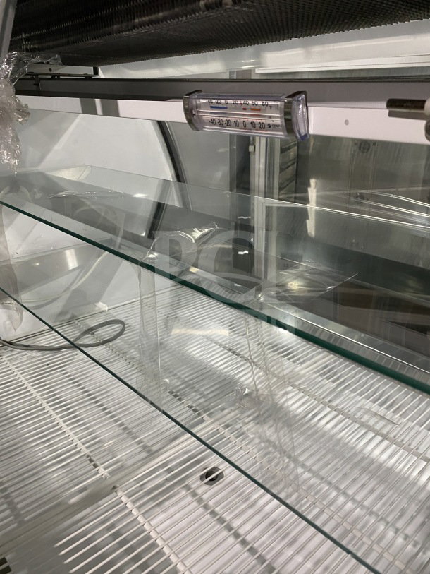 Howard-McCray refrigerated bakery case, Model SC-CBS40E-4C-LED, features glass shelving and temperature gauge, 115V, 1 Phase.