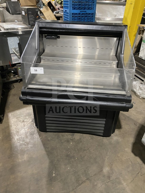 Hussmann commercial open-air specialty merchandiser, self-contained, 115V. Stainless steel interior, clear panels, excellent condition.