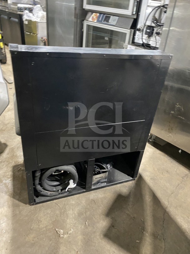 Hussmann commercial self-contained open-air horizontal merchandiser, electrical powered, 115V, sturdy design, moderate condition.