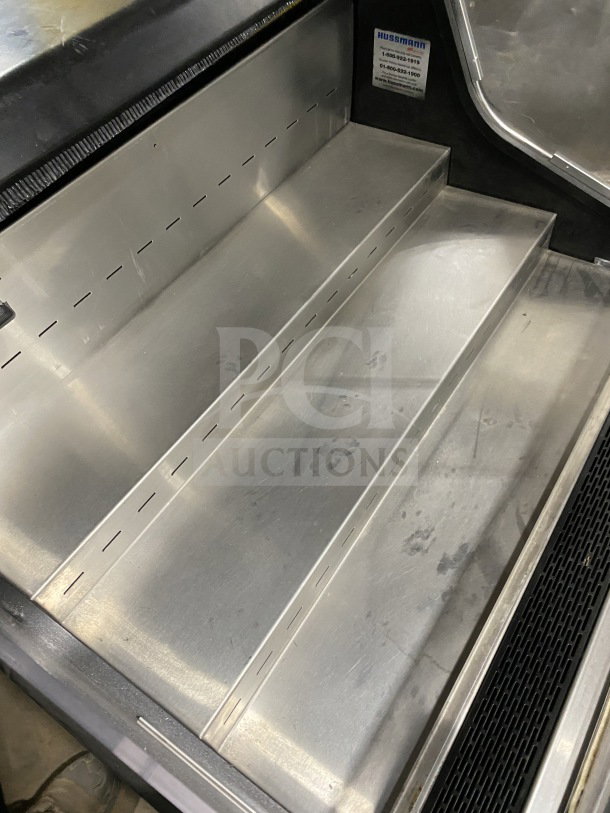 Hussmann commercial self-contained open-air horizontal merchandiser, stainless steel, 115V, electrical powered, good condition.