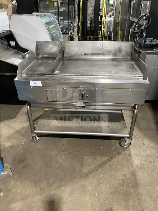 AccuTemp Accu-Steam stainless-steel flat-top griddle on rolling utility stand, gas powered, commercial-grade, used condition.